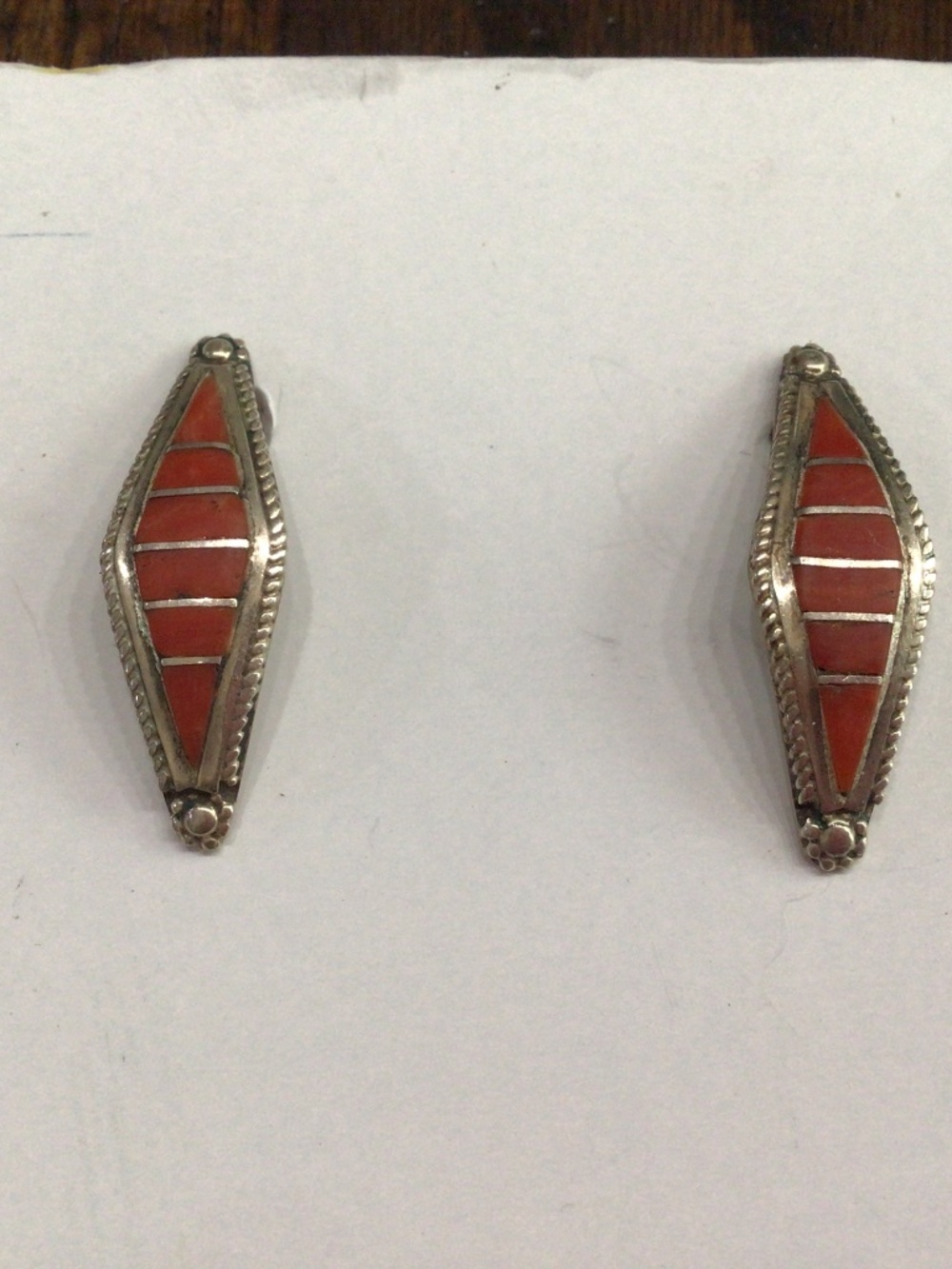 Nevette diamond shape southwestern post earrings with Mediterranean coral